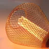 11702 nagyméretű nyújtott harang alakú E27 designer LED izzó réz rácsos textúrával