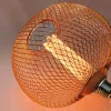 11706 nagyméretű lapított gömb alakú E27 designer LED izzó réz rácsos textúrával