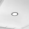 Fekete, kerek Avide Extra Ring alumínium dekorgyűrű egy 18w-os beépített fehér LED panellel, mennyezeten