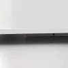 Prémium, fehér üveg infrapanel egy modern, minimalista nappali falán, egy elegáns kanapé fölött 800W