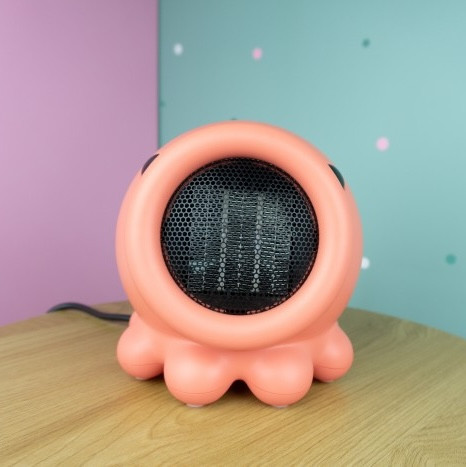 Rózsaszín, polip formájú MARY'S mini hősugárzó gyerekszobai használatra.