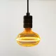 Nagyméretű, borostyánszínű G130 vintage LED izzó egyedi, UFO stílusú filamenttel